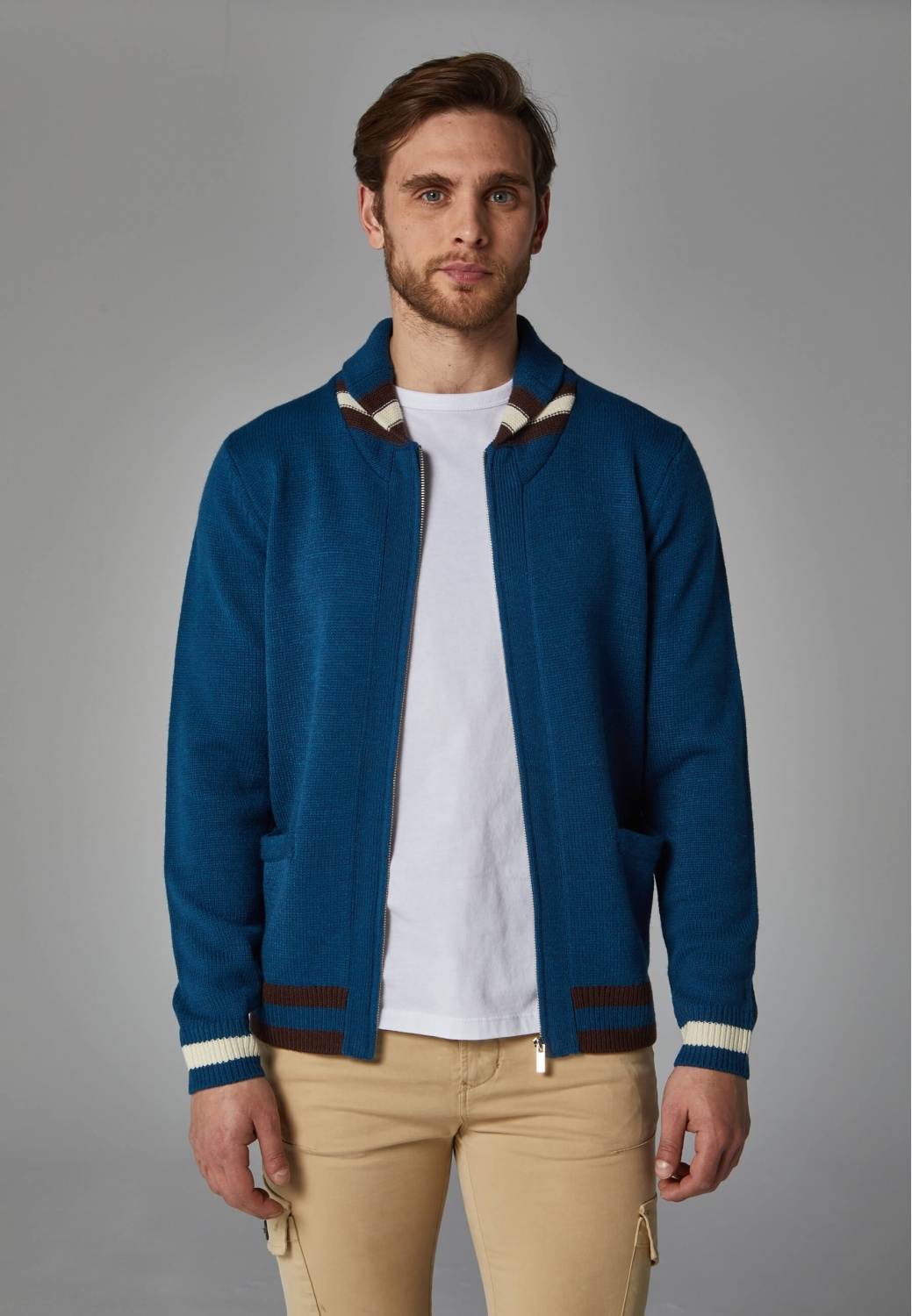 BLUE KNITTED JACKET WITH...